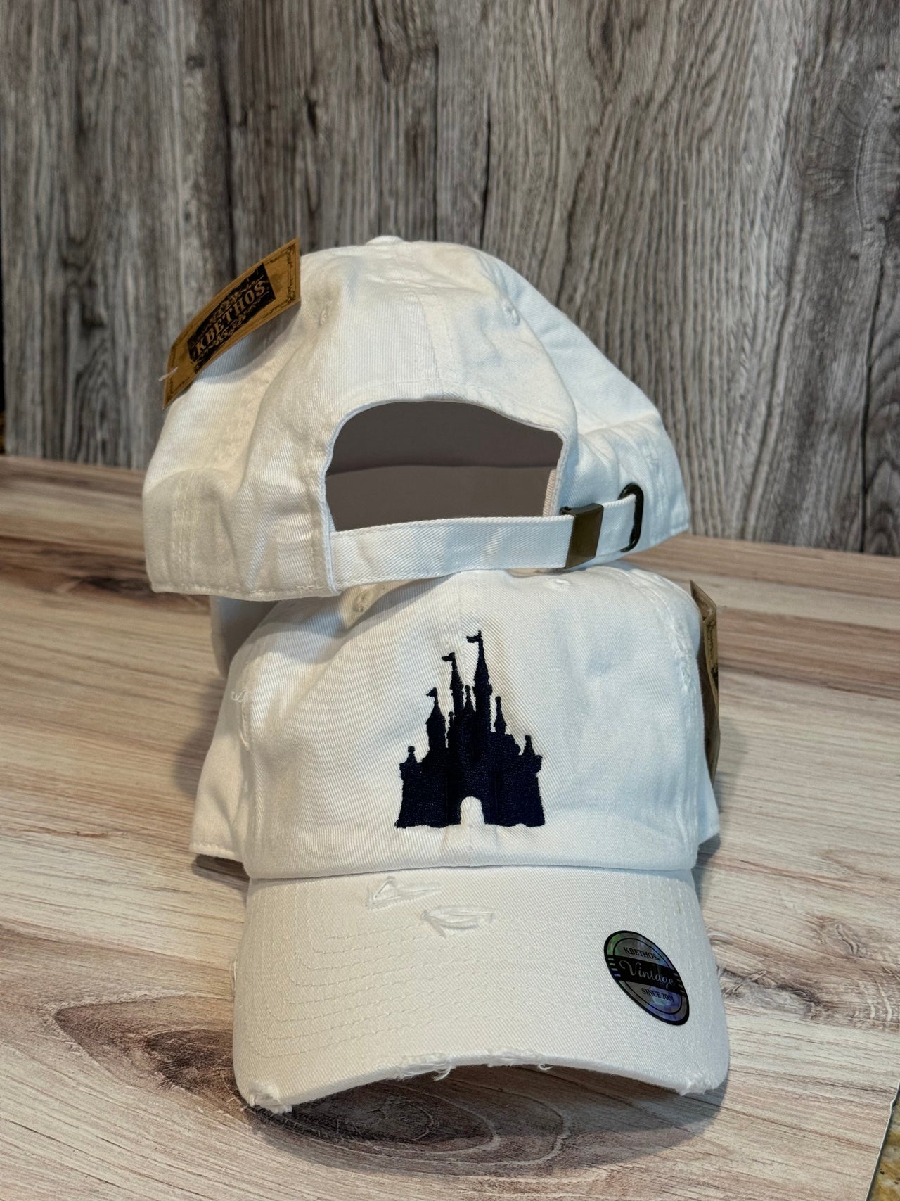 White Hat with Embroidered Navy Castle